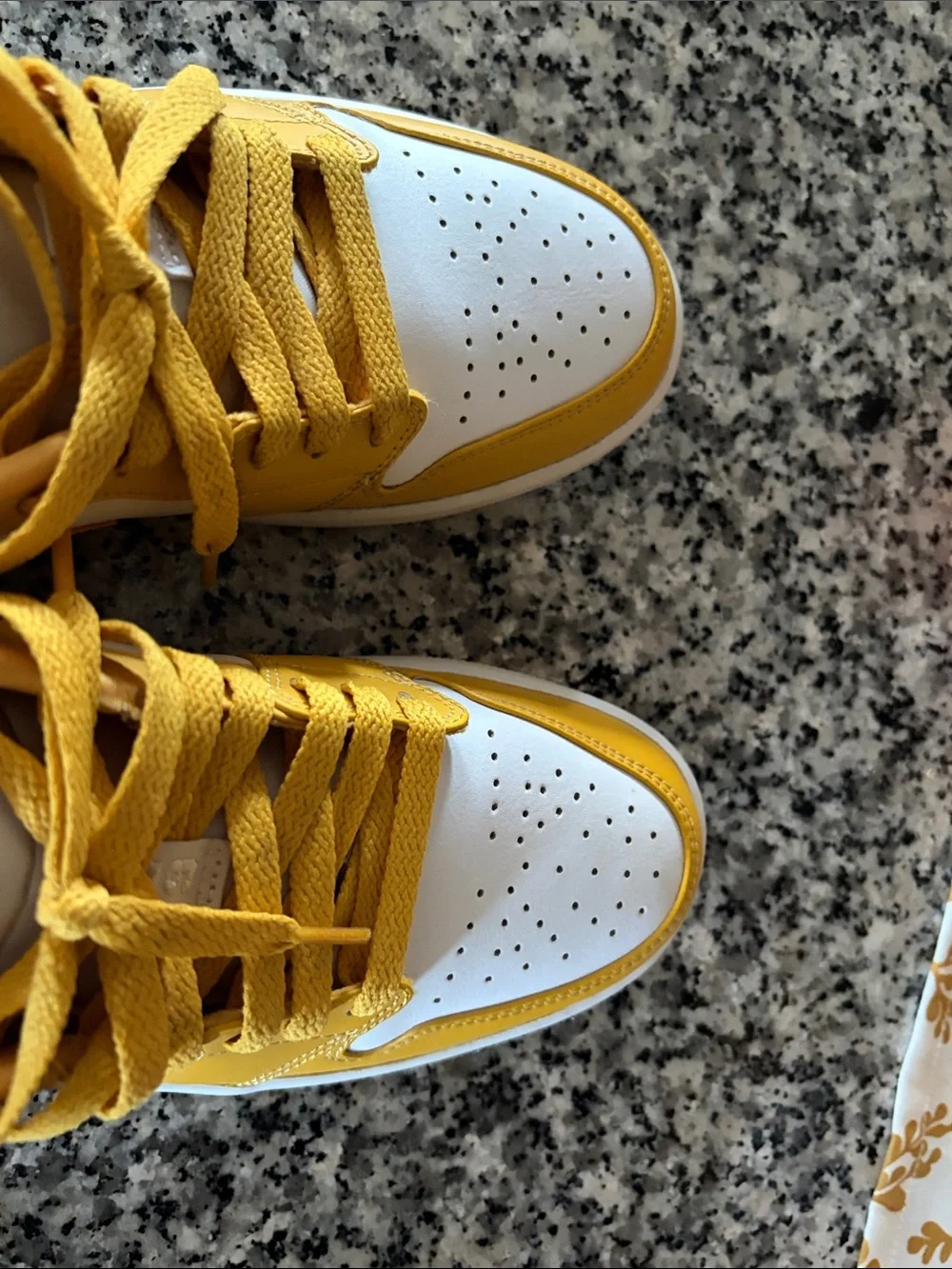 Yellow and White Low-Top Jordan’s Nike Sneakers